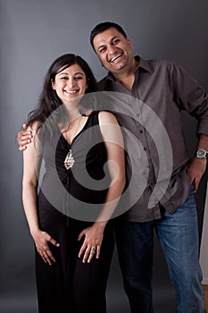 Happy East Indian Husband with his Pregnant wife