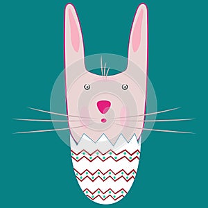 Happy Easter bunny inside a cracked egg.