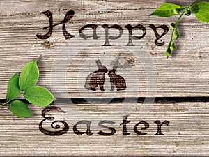 Happy Easter - burned an inscription on a wood.