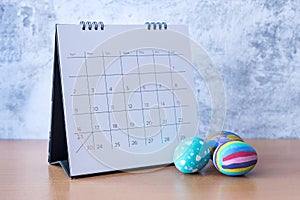 Happy Easter Calendar with an easter egg. Easter festive holidays concept