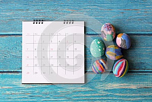 Happy Easter Calendar with an easter egg. Easter festive holidays concept