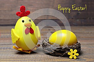 Happy Easter card: Easter chick and egg in the nest
