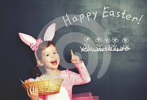 Happy Easter! child girl in costume bunny rabbit with basket of