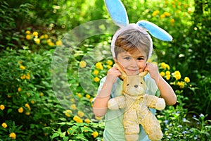 Happy easter. Childhood. Egg hunt on spring holiday. love easter. Family holiday. Little boy child in green forest