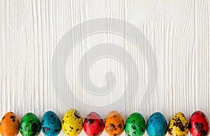 Happy Easter.Colored, boiled, quail eggs