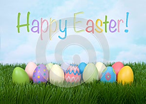 Happy Easter colorful eggs in grass