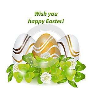 Happy Easter.Colorful, strips patterned eggs in the green grass,