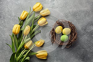 Happy Easter. Congratulatory easter background. Easter eggs and flowers