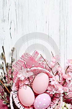 Happy Easter. Congratulatory easter background. Easter eggs and flowers. Background with copy space. Selective focus