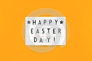 Happy Easter Day text message on a lightbox, greeting card concept