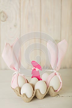 Happy easter. Decor of Easter eggs - napkins in the form of ears