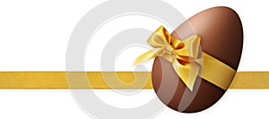 Happy Easter decoration chocolate egg with golden shiny ribbon bow, isolated on white background. Template for label, gift