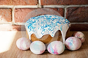 Happy easter. Dessert. Backery. Painted eggs. Easter cake on table. Spring preparation. Marble shell. Easter cake with sprinkles