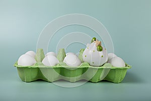 Happy Easter. Easter eggs. Chicken white eggs on green background