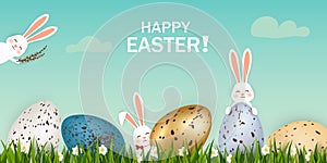 Happy Easter. Easter Rabbit Bunny with eggs, grass, flowers in field. Cute, funny cartoon rabbit character with Paschal