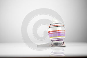 Happy Easter! Easter Egg in an eggcup for breakfast, egg in eggcup for easter breakfast