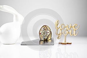 Happy Easter! Easter Egg in an eggcup for breakfast, egg in eggcup for easter breakfast