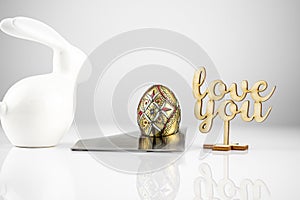 Happy Easter! Easter Egg in an eggcup for breakfast, egg in eggcup for easter breakfast