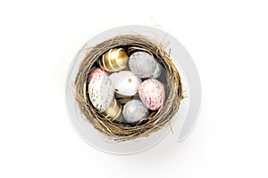 Happy Easter eggs white background. Golden shine decorated eggs in basket, for greeting card, promotion, poster