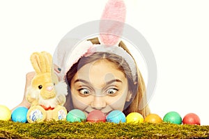 Happy easter girl in bunny ears with colorful eggs, rabbit