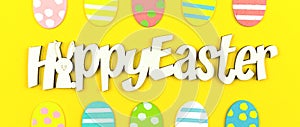 Happy Easter greeting card banner concept with text message and eater painted eggs over the yellow background