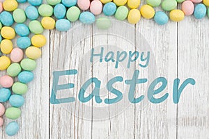 Happy Easter greeting with Easter egg on weathered wood