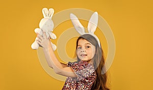 Happy easter holiday. Spring holiday preparation. Tender love. Springtime concept. Little girl hold hare toy. Happy