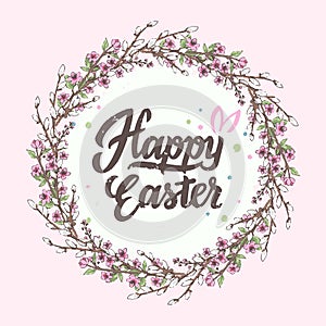 Happy Easter inscription with Spring blossom branches