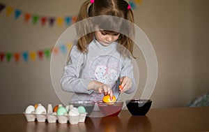 Happy easter. Little girl painter painted eggs. Kid preparing for Easter. Painted hand. Finger paint. Art and craft concept
