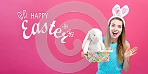 Happy Easter message with woman with Easter basket