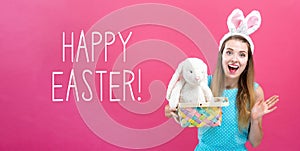 Happy Easter message with woman with Easter basket