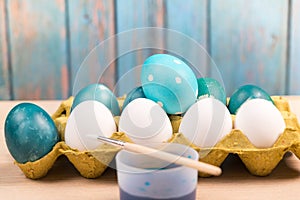 Happy easter, organic blue easter eggs with white color eggs wait for painting, easter holiday decorations