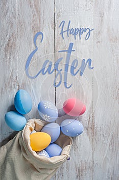 Happy easter painted eggs and text