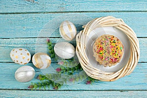 Happy Easter. Painted eggs on wooden table. Easter Cake - Russian and Ukrainian Traditional Kulich, Paska Easter Bread
