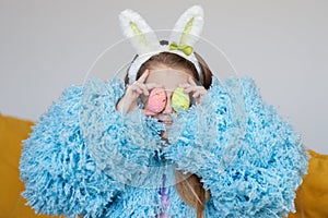 Happy easter! Portrait of funny happy laughing child girl with easter eggs