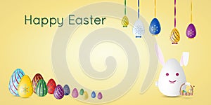 Happy Easter postcard or greeting card with painted Easter eggs and rabbit.
