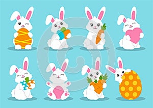 Happy Easter. Set of little cute rabbits. Carrot, bunny, eggs. Colored flat vector illustration isolated on blue background.