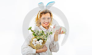 Happy Easter. Smiling Girl with basket eggs and rabbit bunny. Religion symbol. Spring holiday.
