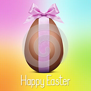 Happy easter text with chocolate egg and pink ribbon bow