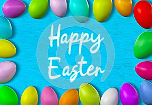 Happy easter text Message with colorful decorated eggs over wooden background