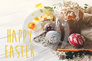 Happy easter text. season`s greetings card. stylish painted egg