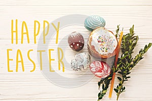 Happy easter text. season`s greetings card. stylish painted egg