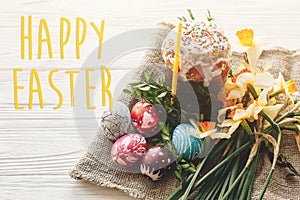 Happy easter text. season`s greetings card. stylish painted eggs