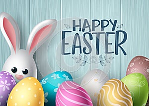 Happy easter vector background design. Happy easter text with colorful egg patterns and cute bunny rabbit