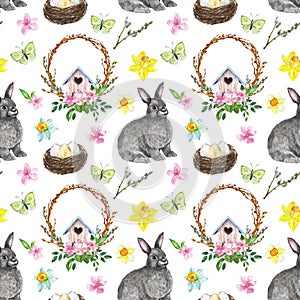 Happy Easter watercolor seamless pattern. Bunny, bird nest, eggs, flowers, decorative wreath, isolated on white background.