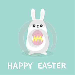 Happy Easter. White bunny rabbit holding painted pattern egg. Flat design. Funny head face. Big ears. Cute kawaii cartoon characte