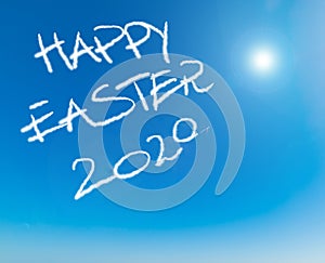 Happy Easter 2020 written in the blue sky