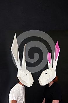Happy easters rabbits couple in masks