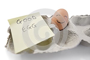 Happy egg with a note written 'good egg'