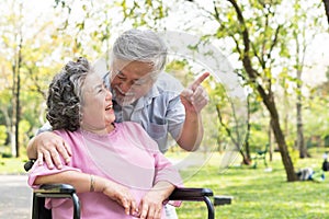 Happy elderly couple with lifestyle after retiree concept. Lovely asian seniors couple embracing together in the park.